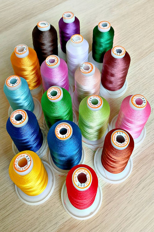 Assortment of threads showcasing various colors and types, offering versatility for sewing and crafting applications