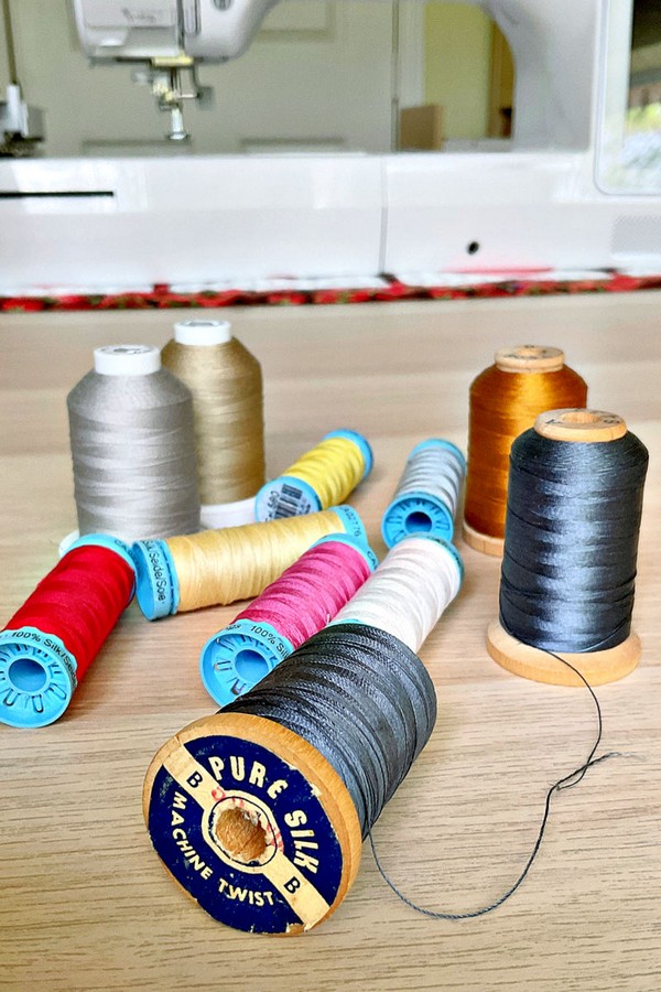 selection of threads in a variety of colors and materials, suitable for a wide range of sewing and crafting projects