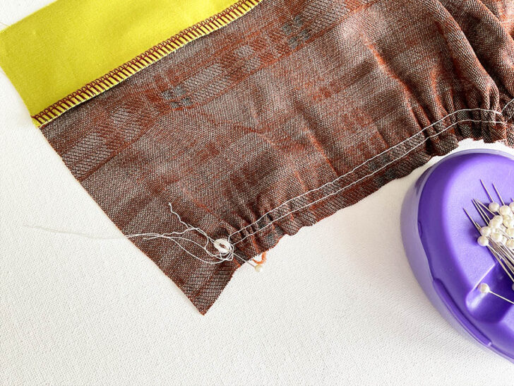 wrap the threads around a pin