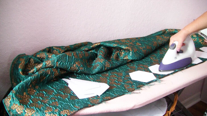 Place your chosen fabric wrong side up on your ironing board