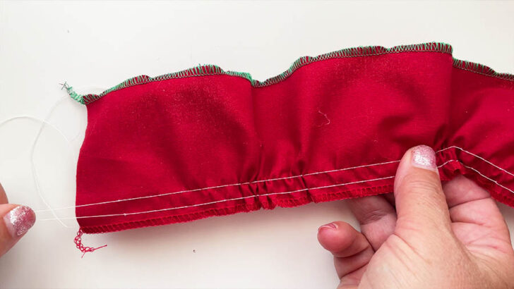 Sew two parallel lines of stitches about 14 inch apart, leaving long thread tails