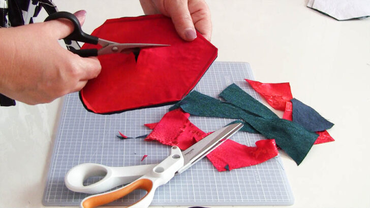 carefully cut a slit in the center