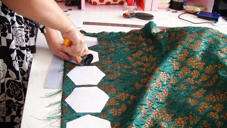 carefully cut around each hexagon shape using a rotary cutter