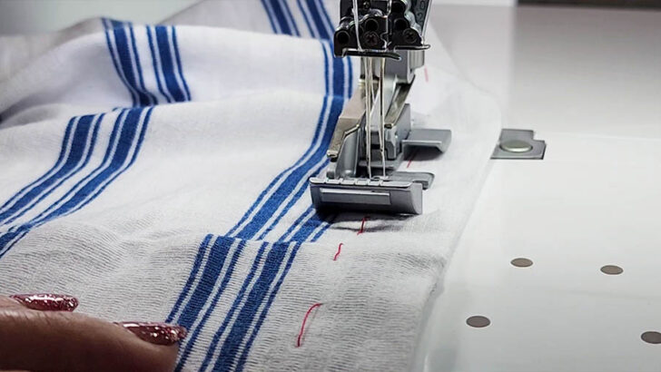 Use the hand wheel to manually move the needles
