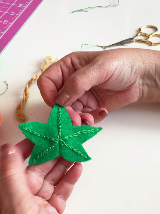 I created leaf veins using a hand-sewn chain stitch