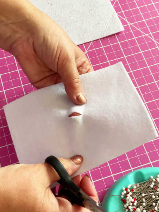 cutting a small part of the felt