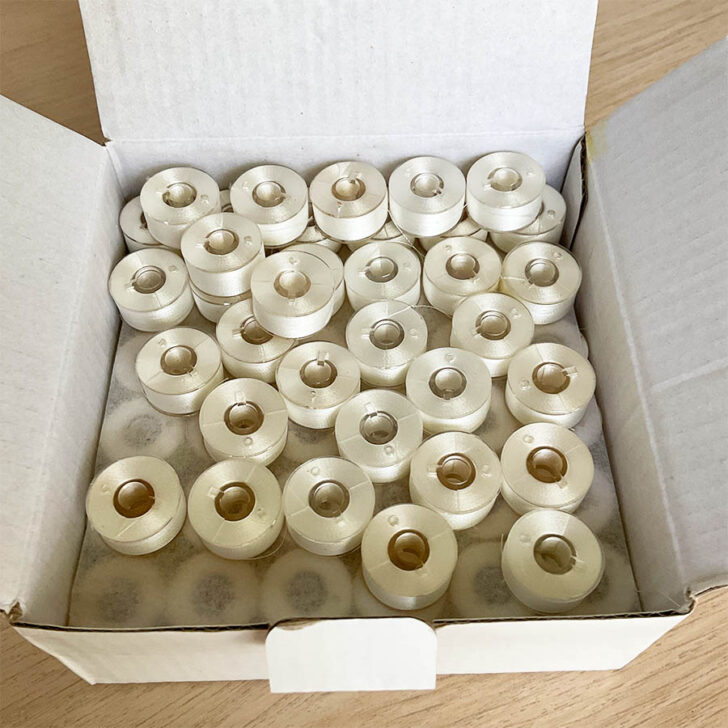 pre wounded bobbins in a box