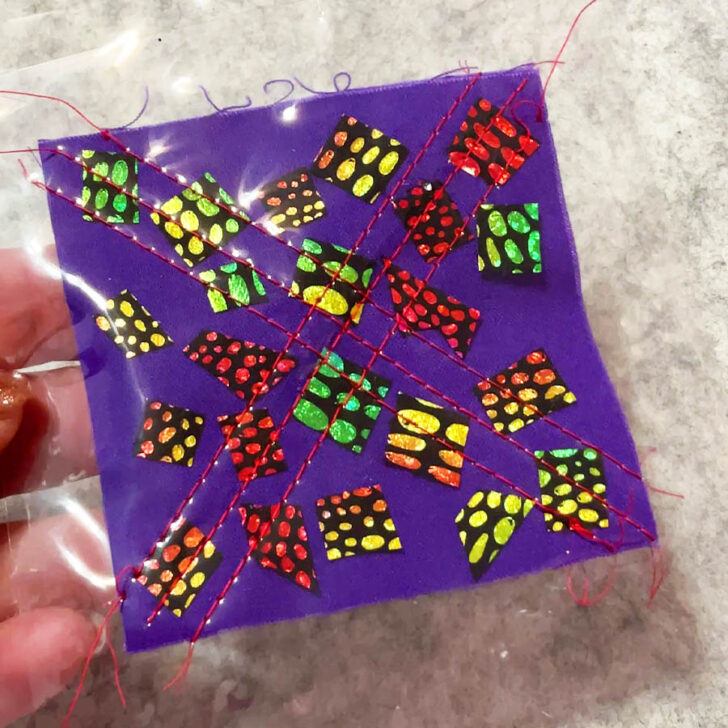 stitching an X across your fabric sandwich
