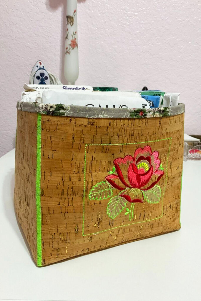 A cork box with beautifully embroidered rose, perfect for sewing room decor