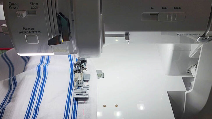 Position the t-shirt under the presser foot with the right side of the fabric facing up