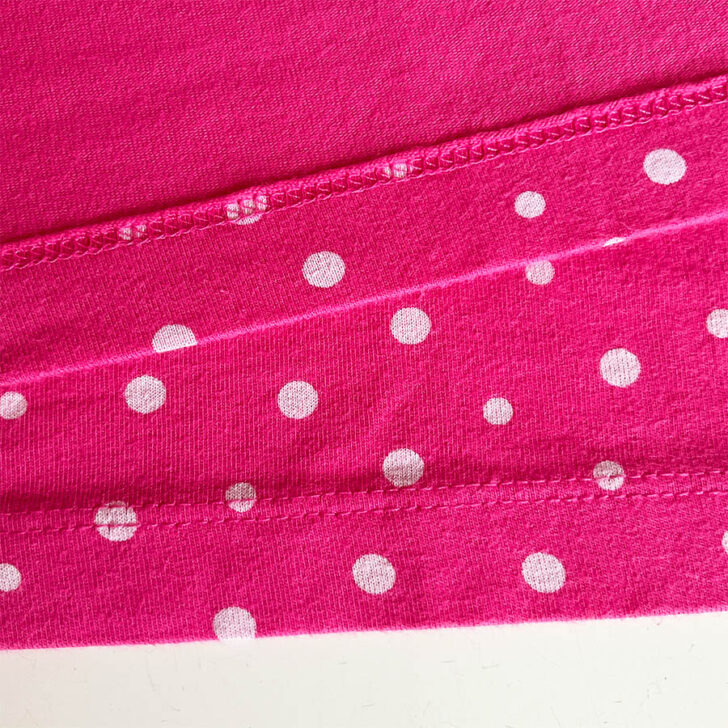 covertitch hem on pink knit fabric