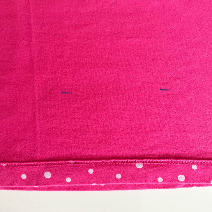 marking new length of shirt