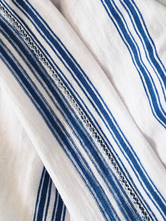 two parallel rows of stitching on the outside and a looper stitch underneath