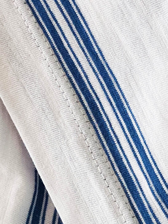 two parallel rows of stitching on the outside and a looper stitch underneath
