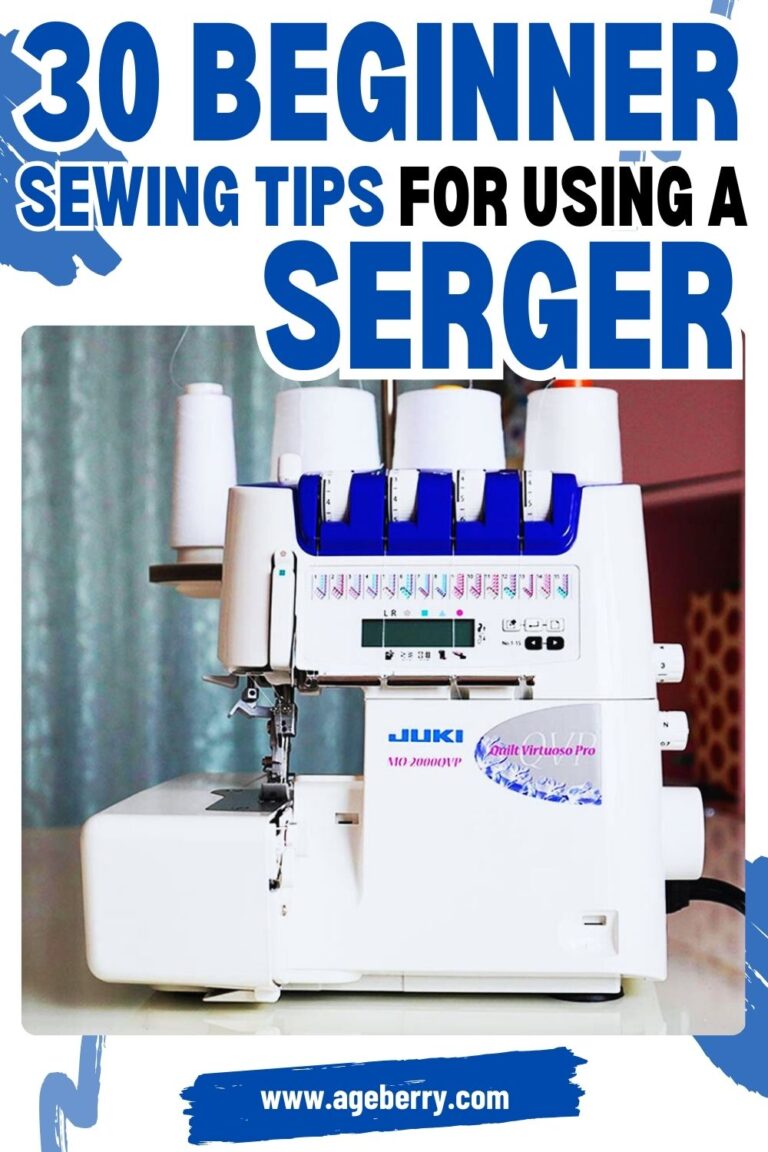 A close-up of a white Juki MO-2000QVP serger machine with blue and purple accents, set against a blurred background. The image features the title "30 Beginner Sewing Tips for Using a Serger" in bold blue and black text, with "www.ageberry.com" at the bottom on a brushstroke-style banner.