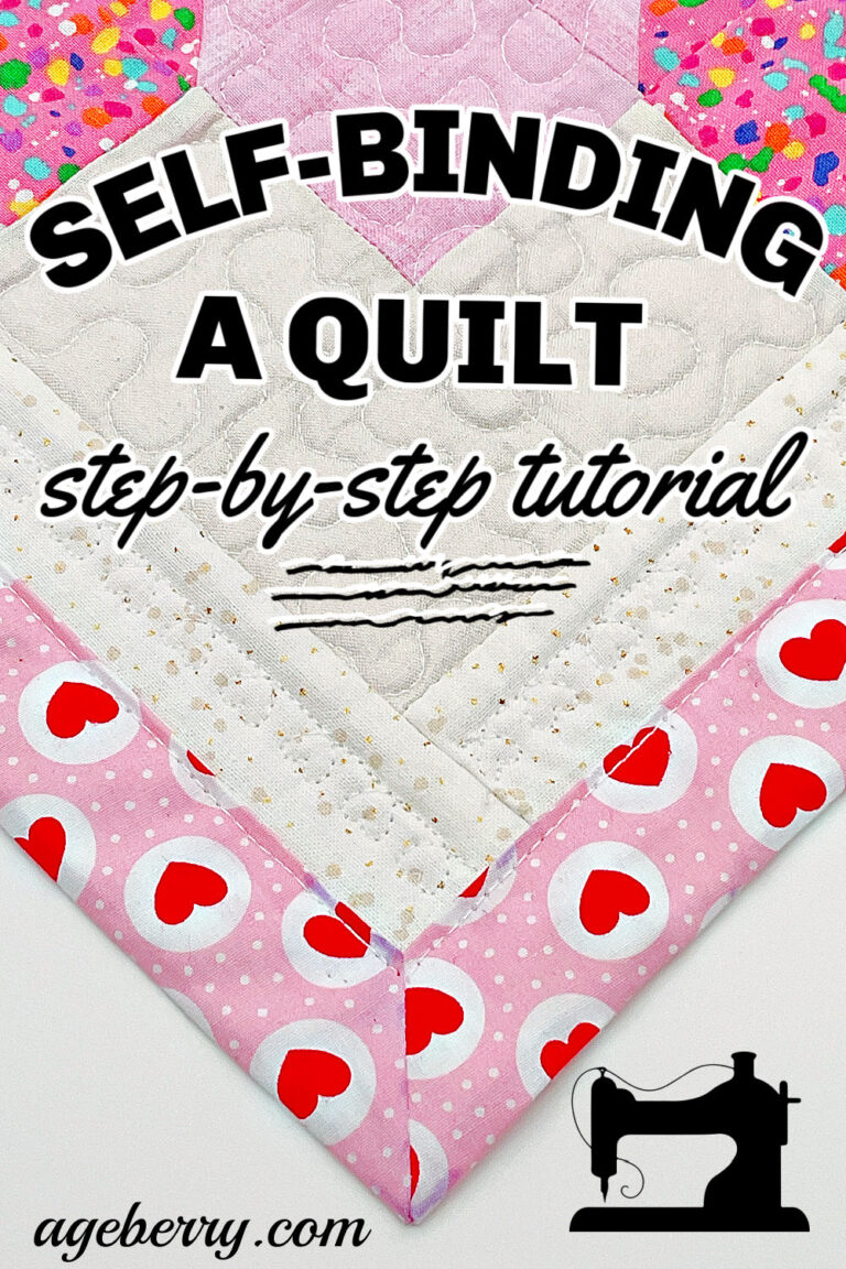Close-up of a mitered corner on a quilt with a pink and red heart backing, featuring text overlay: "Self-Binding a Quilt - Step-by-Step Tutorial," showcasing a clean self-binding quilt finish.