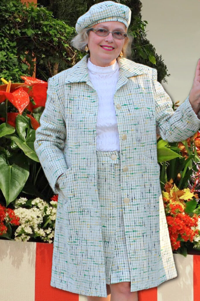 A fashion sewing tutorial showcasing a coordinated set of a Chanel-inspired coat, skirt, and beret made from textured tweed-like fabric