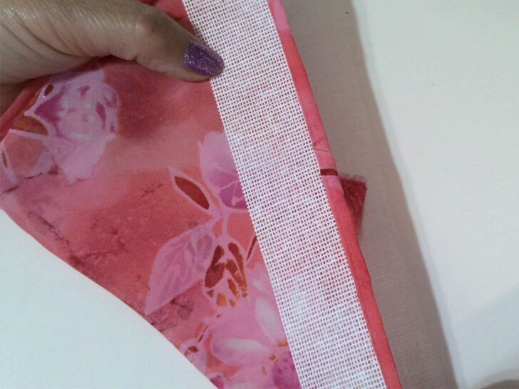 flipping the fabric over the buckram strip