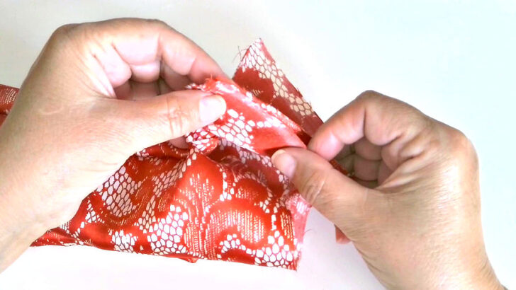 sew short ends of the tube together