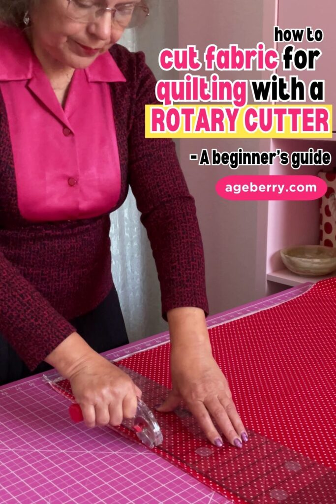 A woman in a red blouse demonstrating the use of a rotary cutter to cut fabric on a pink cutting mat. The text overlay highlights a beginner’s guide to using a rotary cutter for precise fabric cutting in quilting projects.