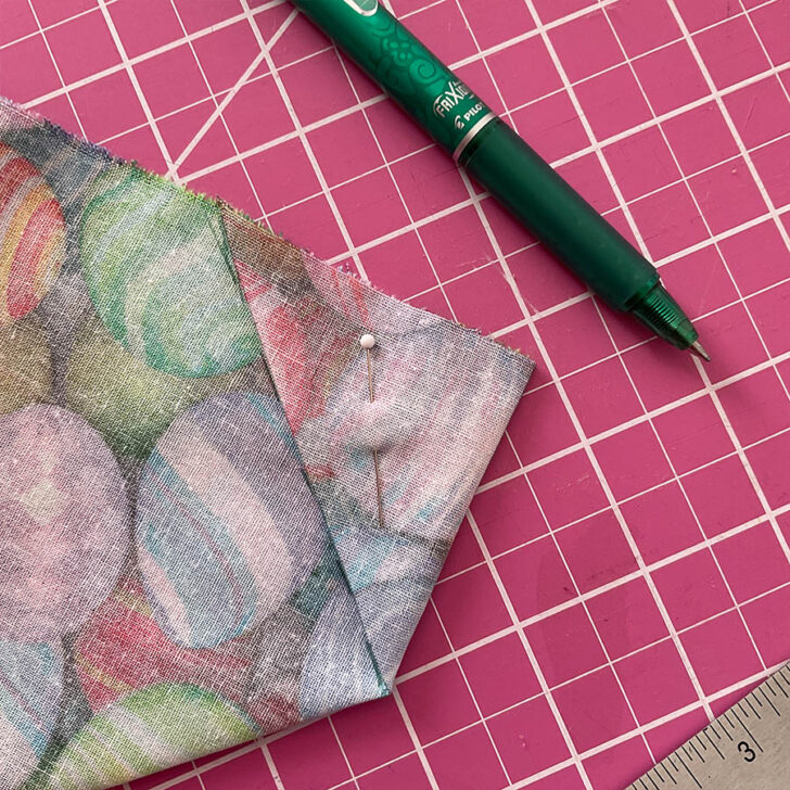 Fold in the backing fabric to obtain the final sewing line