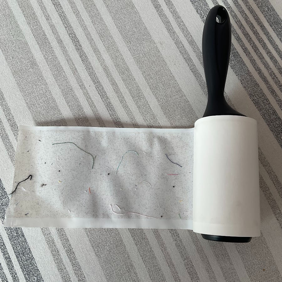Lint roller used to clean up the sewing area