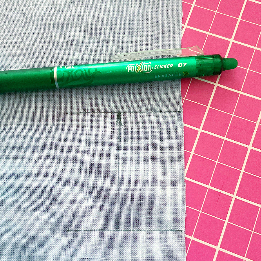 Green Frixion erasable pen used to mark sewing lines on fabric.