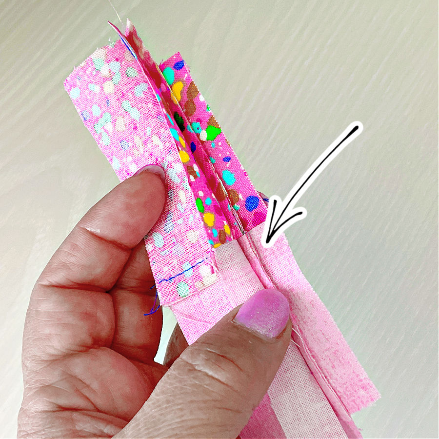 image showing how a 10 layers seam looks like after carefully trimming the unnecessary portions of the seam allowances