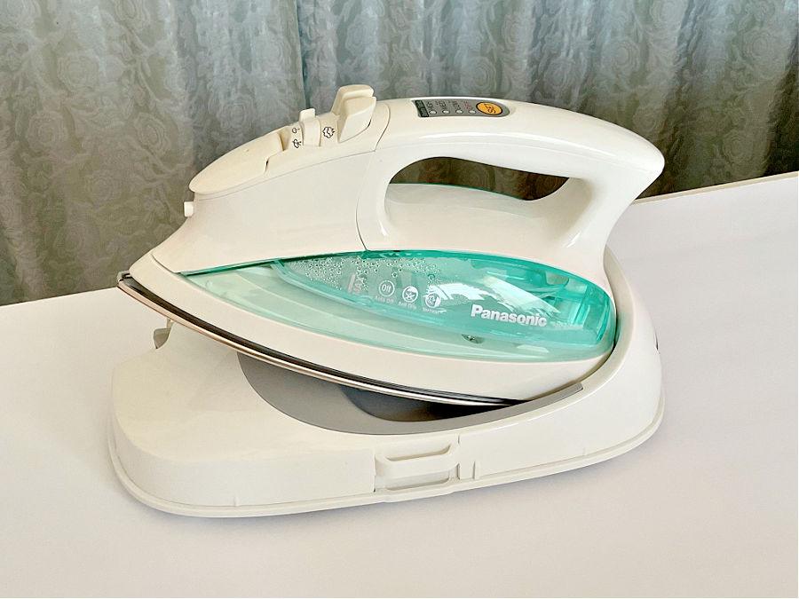 image of a panasonic cordless iron on its support