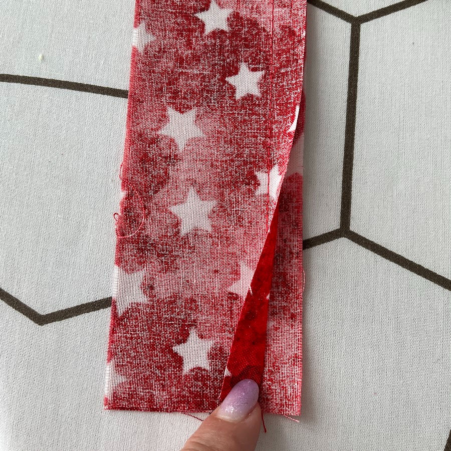 image shows two pieces of fabric sewn incorrectly with one right side and one wrong side together
