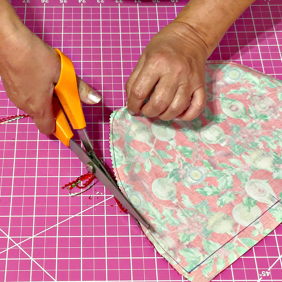 using pinking shears to clip seam allowances to reduce bulk