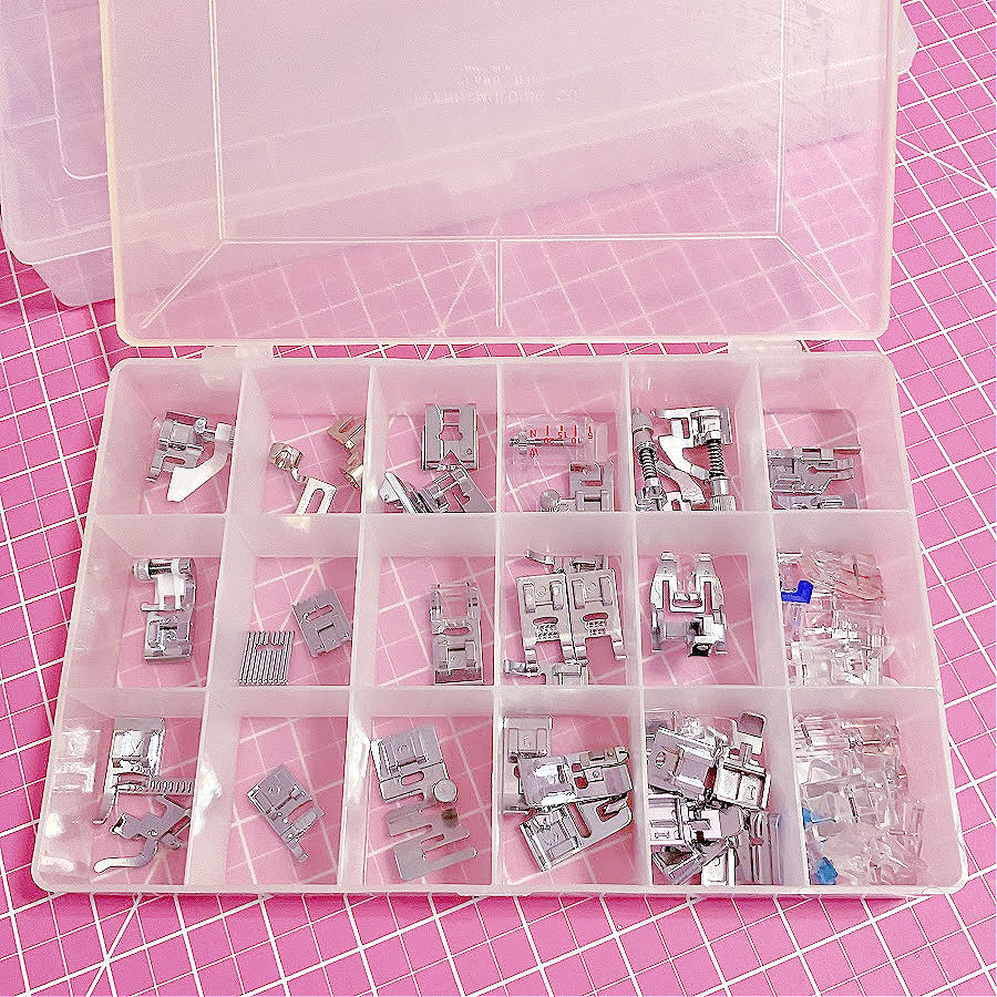 a plastic box divided in small compartments in each compartment there are multiple pressure feet in storage