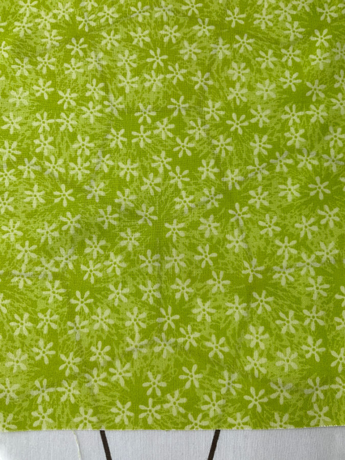 the piece of fabric shown in a previous image with deep creases after being pressed