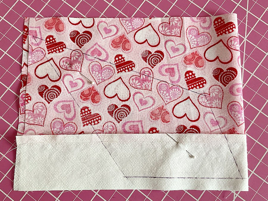 the pattern markings on the piece of fabric prepared for cutting the body of the fabric angel
