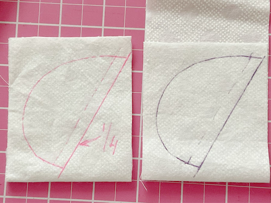 image showing the wing piece drawn on the white fabric with the added seam allowance markings in the proper place