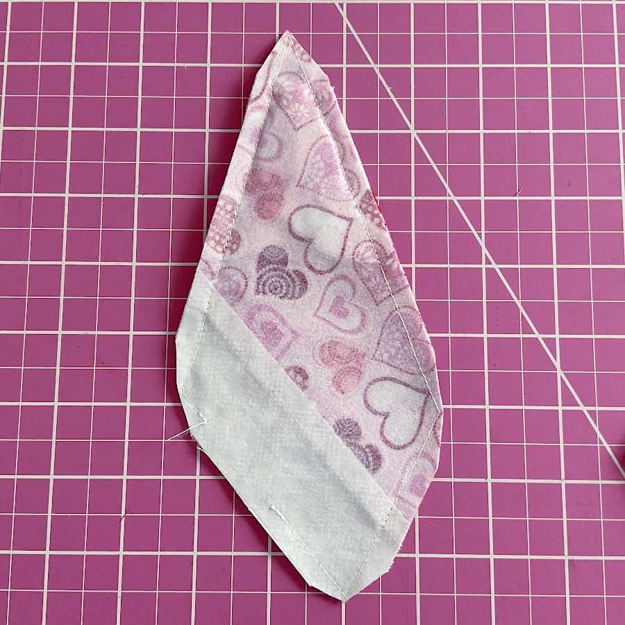 the fabric angel after the corners of the seams have been clipped to reduce the bulk before turning right side out