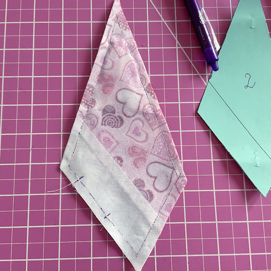 the fabric angel after the final stitching and pressing of the seam. the item is still wrong side out