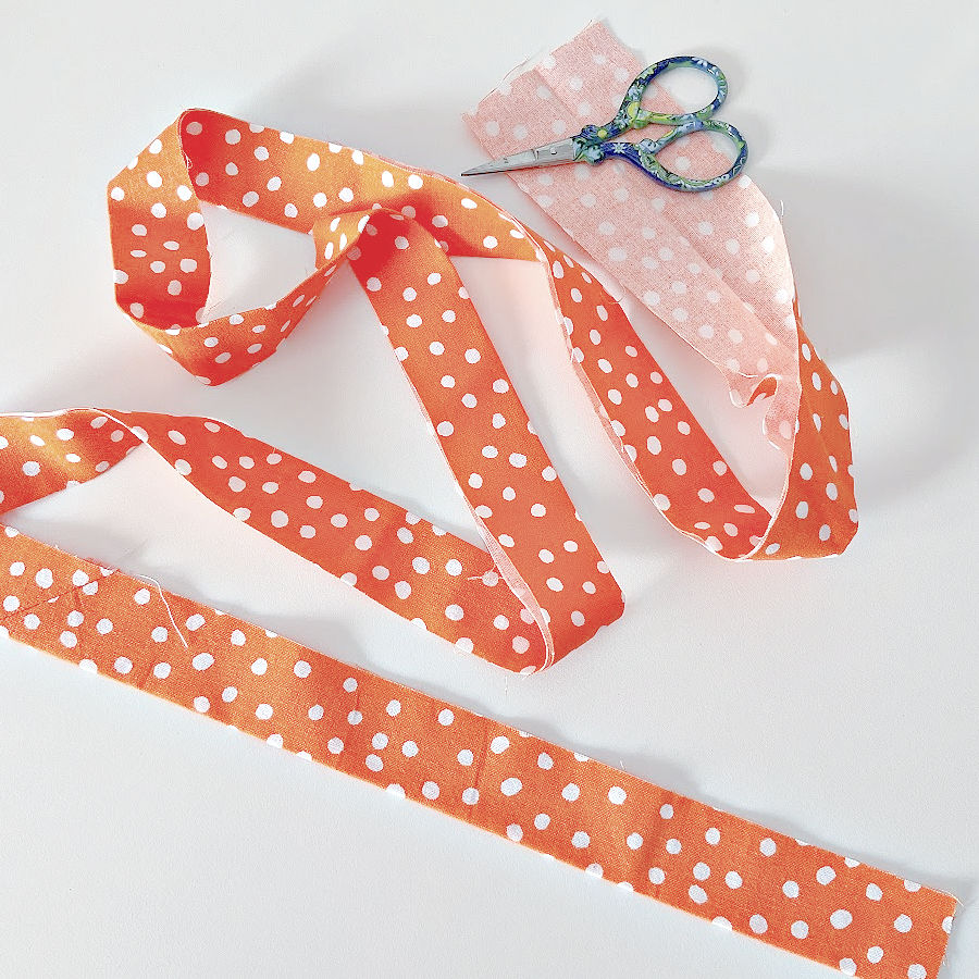 polka dots binding tape using single fold a pair of detail scissors sitting on top