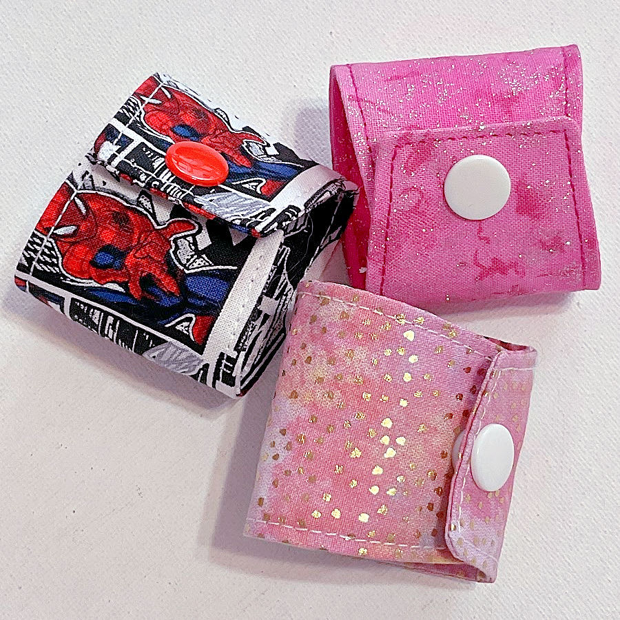 cord holders with all kam snaps in closed position ready to be used
