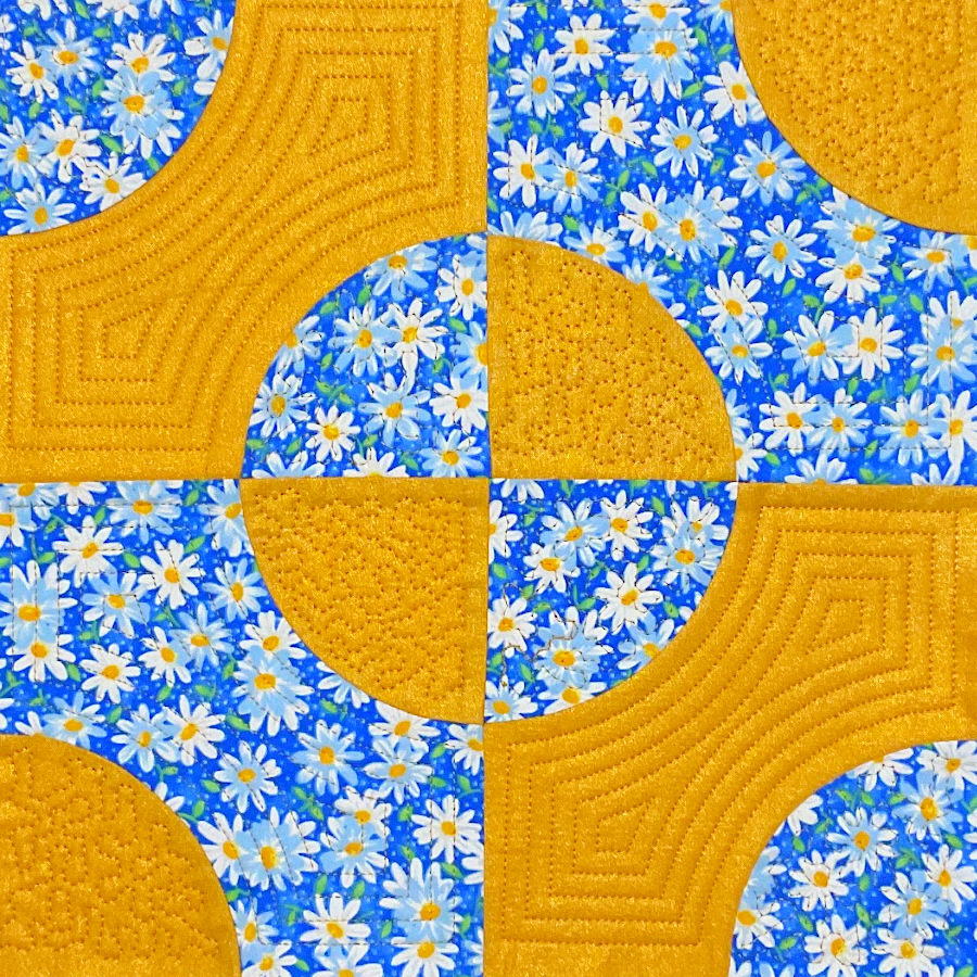 quilt block made with quarter circle shapes