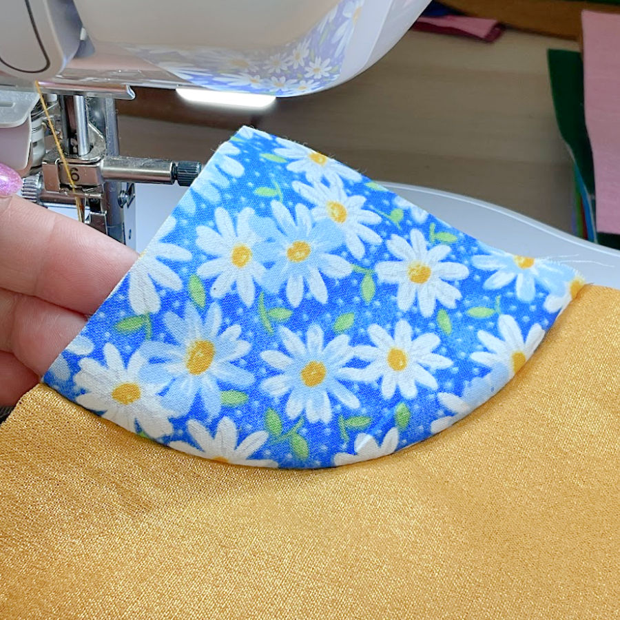 the curved seam seen on the right side of the fabric