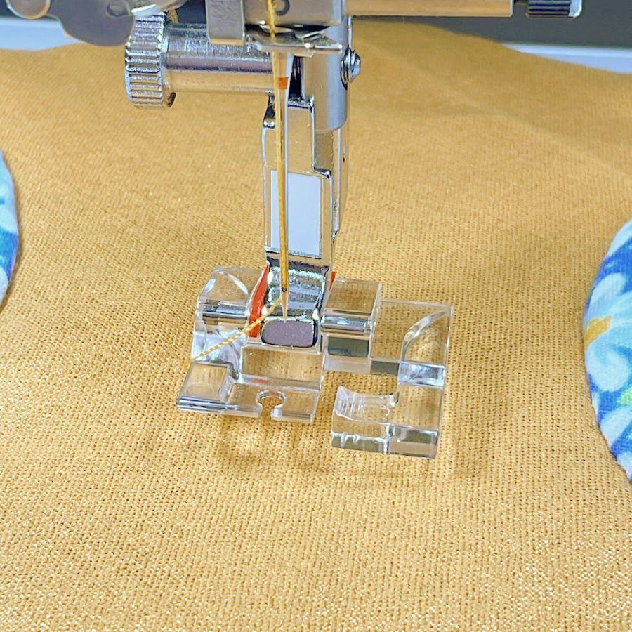 curve master presser foot mounted on a sewing machine