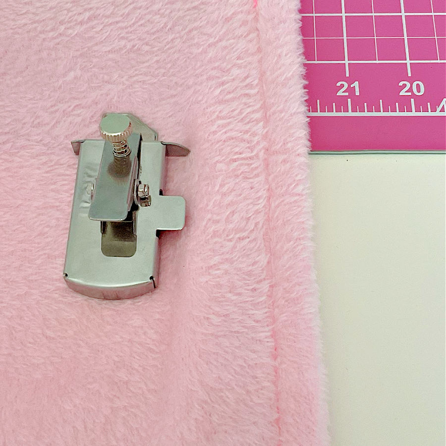 the magnetic seam guide on a piece of faux fur with a straight stitch made using the seam guide