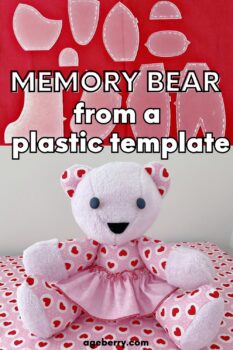 Clear plastic templates for sewing a memory bear displayed on red fabric, with a completed sitting memory bear in pink and red heart-print fabric and a pink skirt.