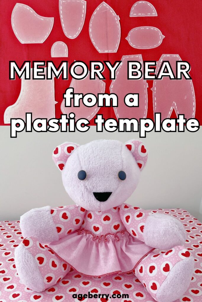 Clear plastic templates for sewing a memory bear displayed on red fabric, with a completed sitting memory bear in pink and red heart-print fabric and a pink skirt.