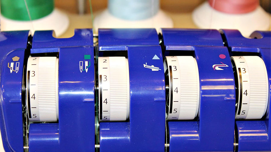 image of the tension adjustment dials on a serger overlock machine