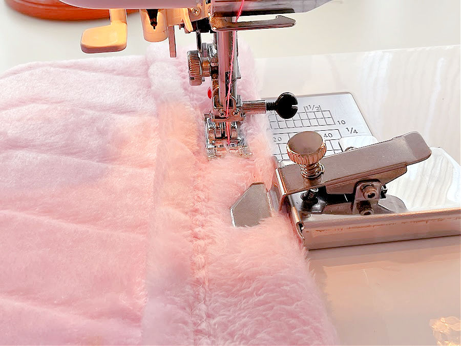 the magnetic seam guide being used with faux fur on a sewing machine