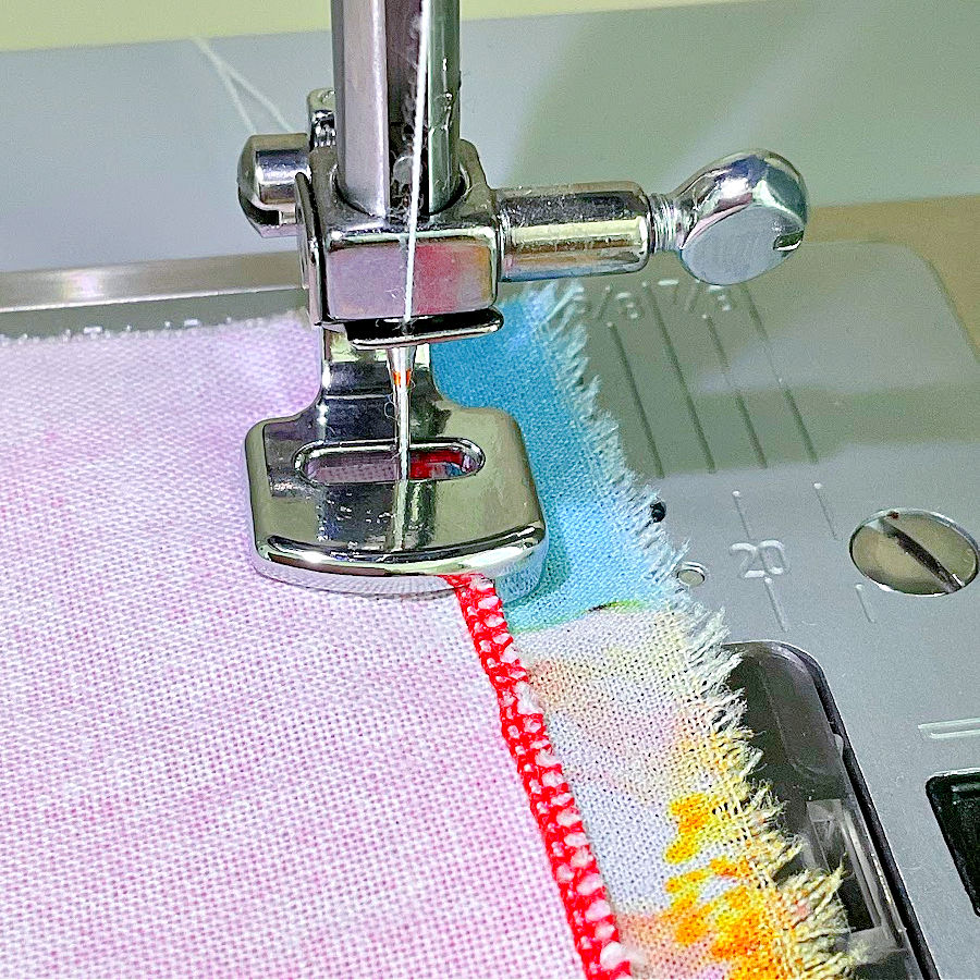 the gathering foot being used to attach gathers to another piece of material