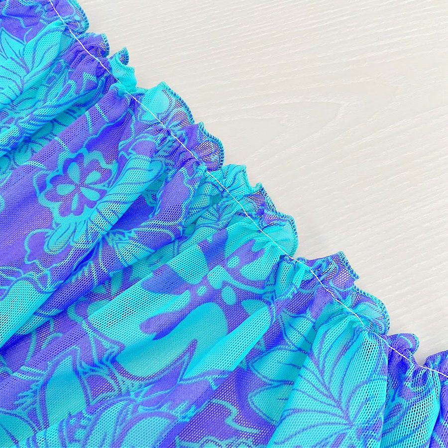 a piece of stretch mesh fabric after being used with the gathering foot the gathers look very good