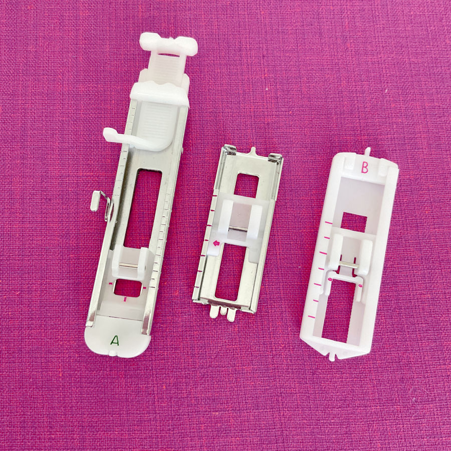 three buttonhole feet for sewing machine made out of plastic, metal and a combination plastic and metal